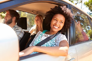 2 men and 2 women in a car